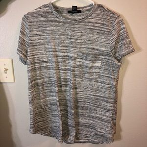 Grey and white striped tee with a pocket
